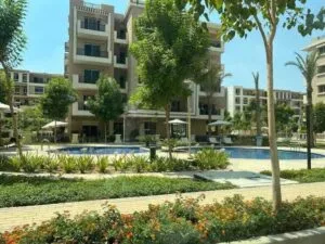 شقة للبيع في كمبوند تاج سيتي – القاهرة الجديدة | 3 غرف على طريق السويس أمام مطار القاهرة الدولي - Thumbnail 1
